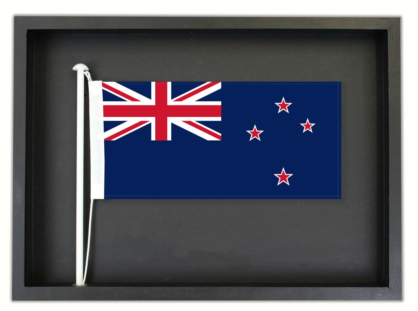 Authentic New Zealand Flag in a Black Oak Frame.